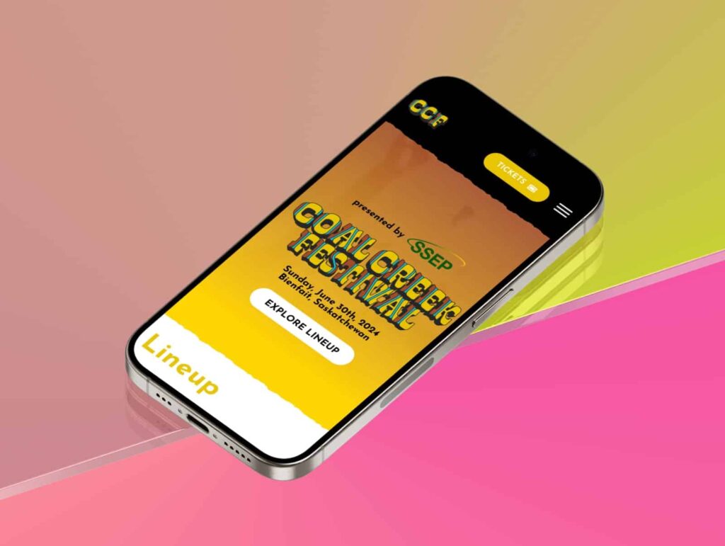 Device displaying web design for Coal Creek Festival
