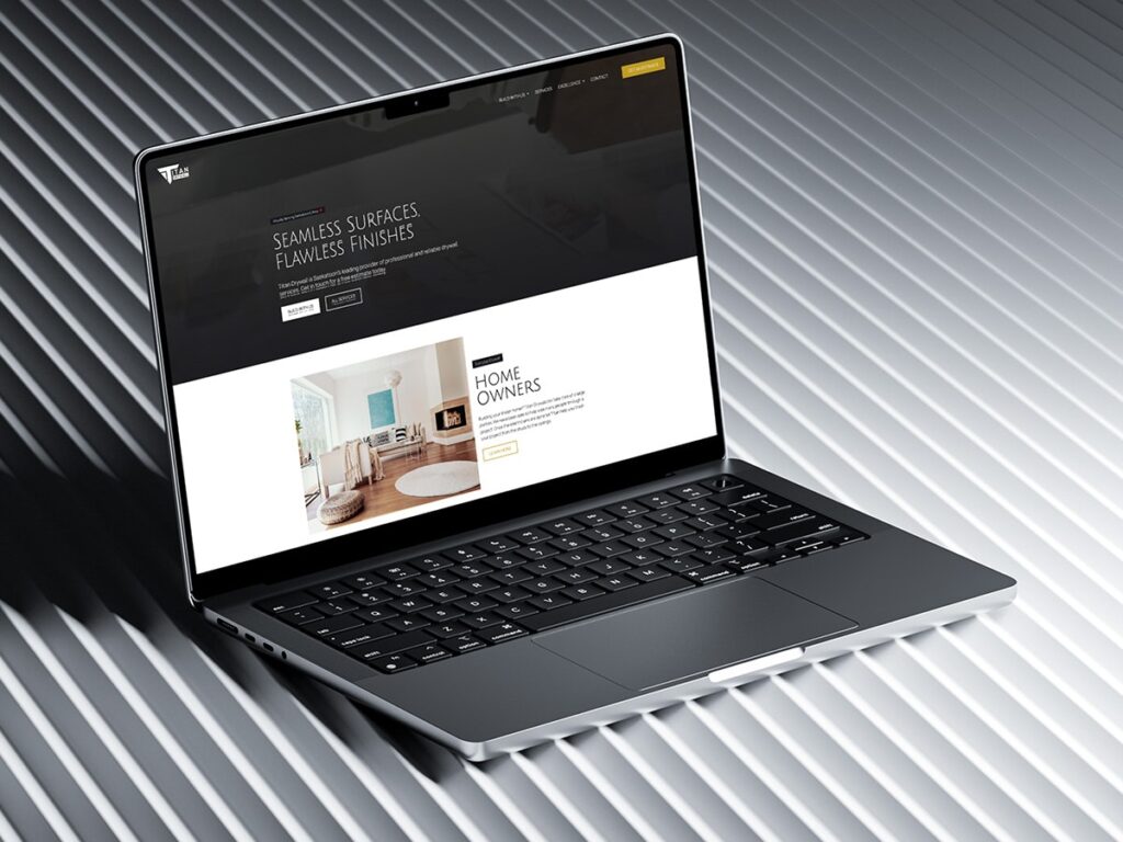 Device displaying web design for Titan Drywall